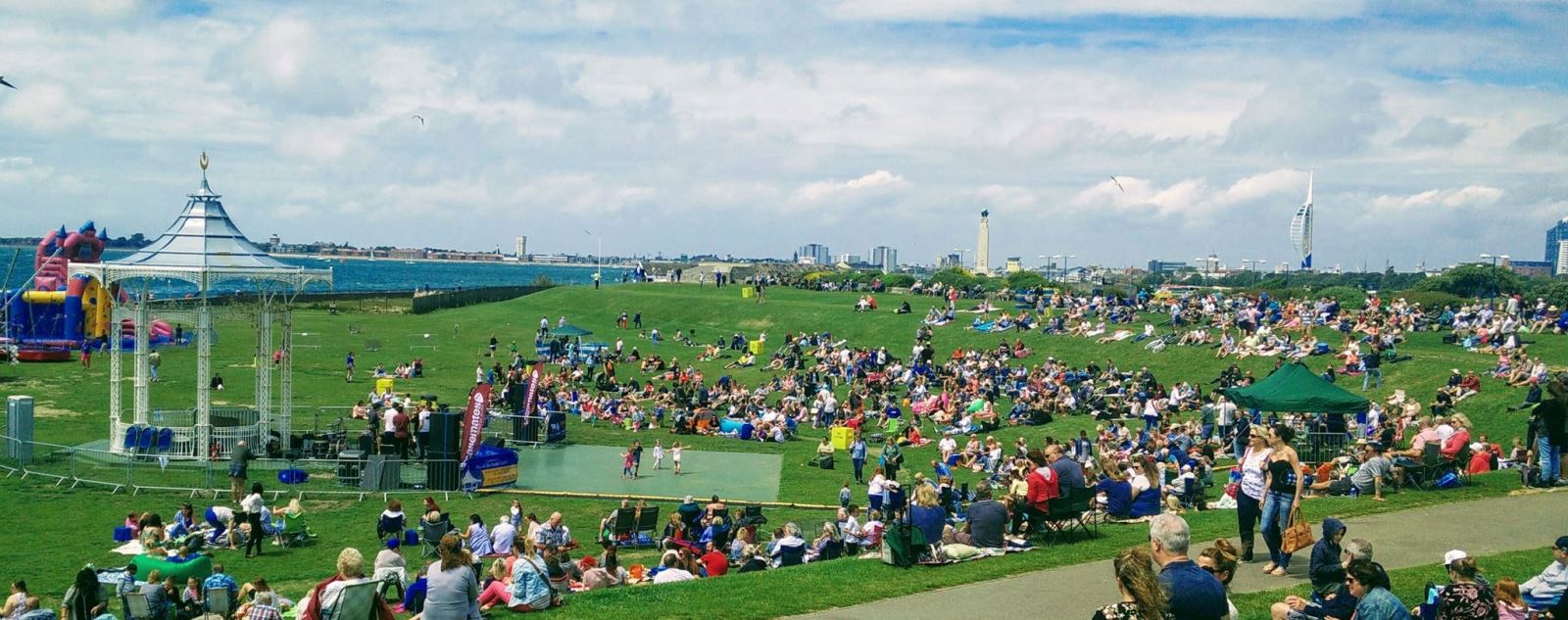 Photograph of people enjoying Southsea Bandstand